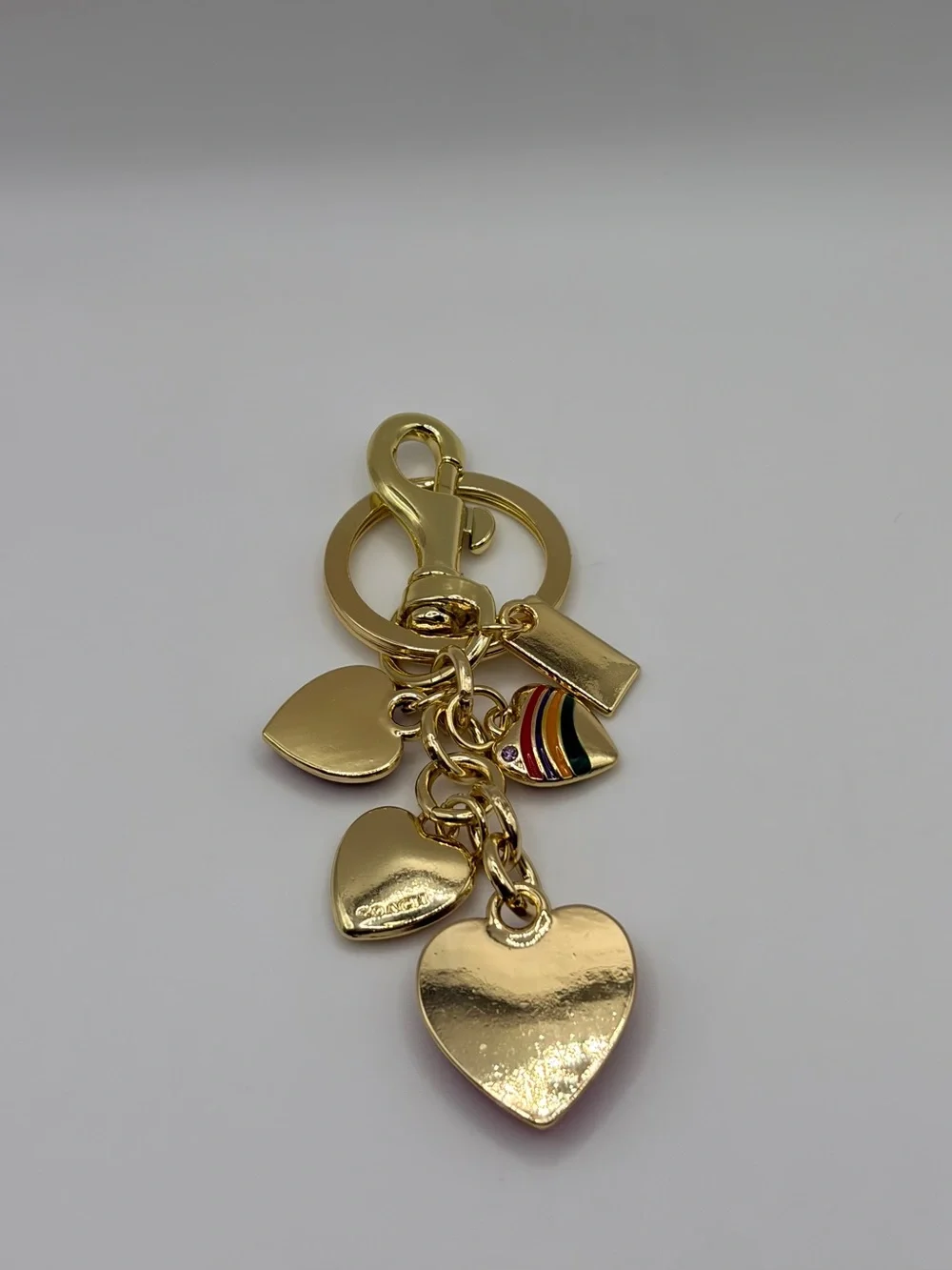 Trendy Gold-tone Heart Charm Keychain with Red Enamel Hearts